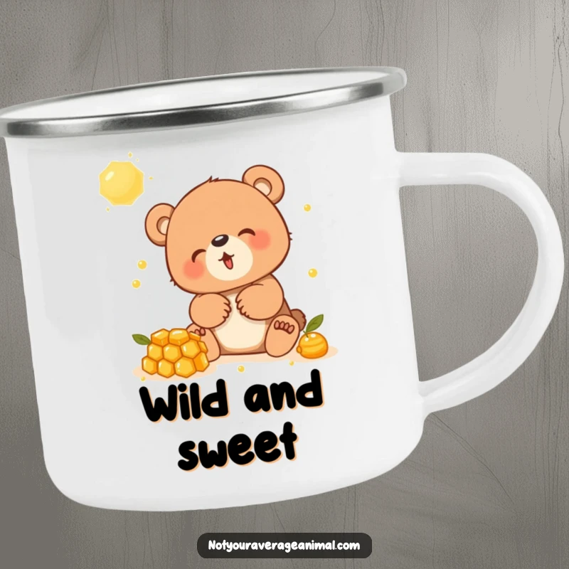 Funny camping mug with a bear cub in hysterics while playing with a sticky honeycomb, ideal for outdoors.