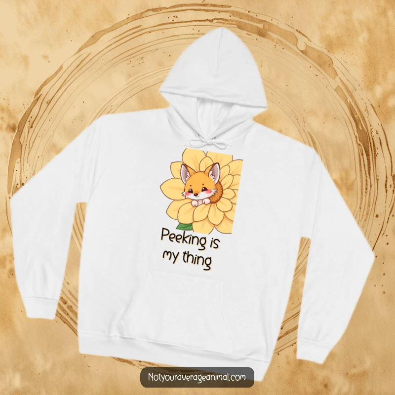 Funny fox hoodie with a playful fox peeking from behind a giant flower, offering warmth and a touch of woodland charm.
