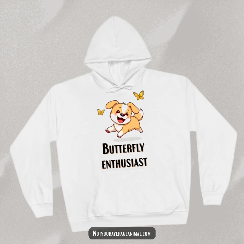 Funny hoodie design of a happy dog with a vigorously wagging tail, chasing after a fluttering butterfly with pure delight.
