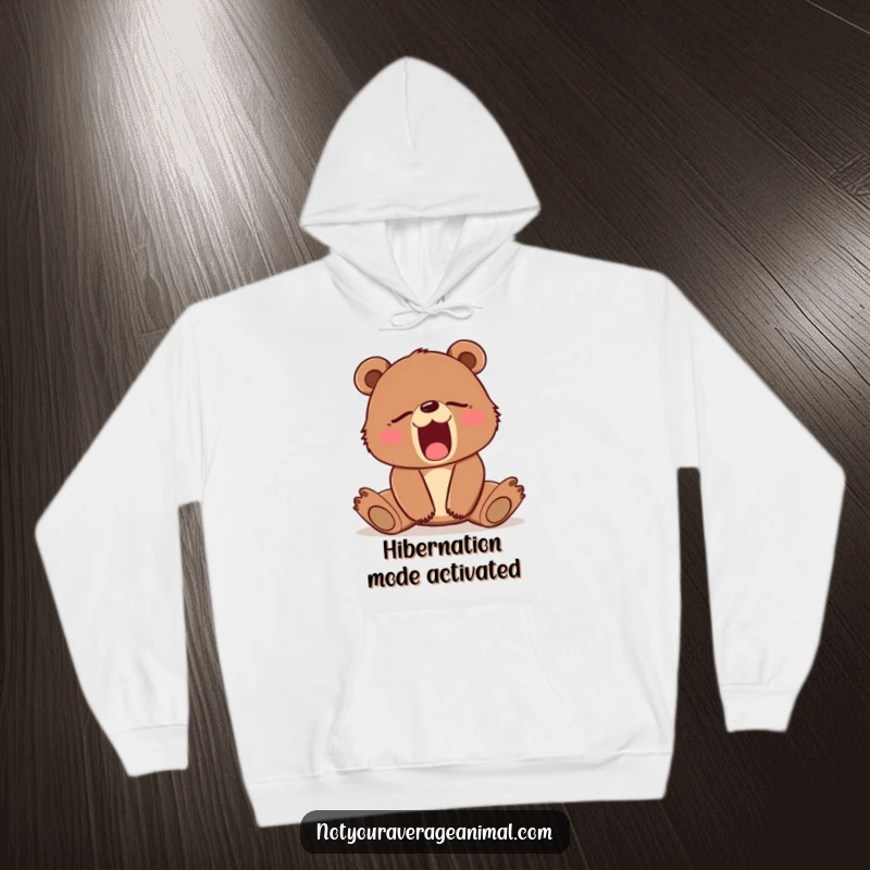 Funny hoodie showcasing a cute brown bear cub caught in a massive yawn, stretching out. Ideal for warmth and laughter.