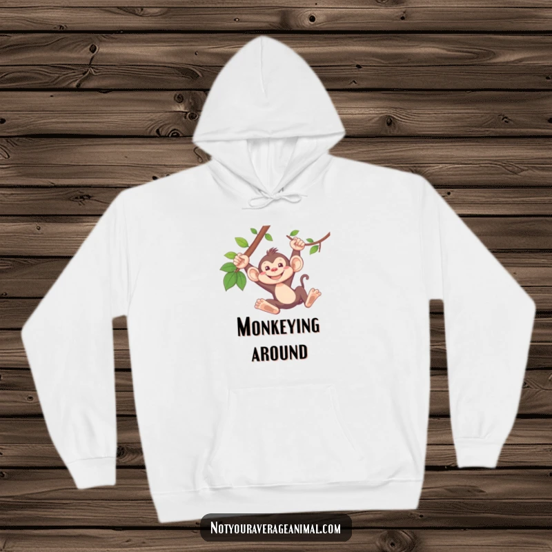Funny monkey hoodie showing a silly monkey with a wide grin, swinging lively from a vine.