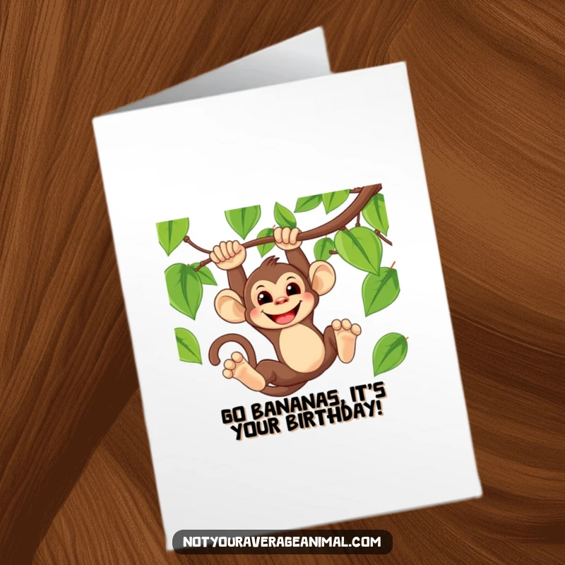 Funny Free Printable Birthday Card of a cheeky monkey grinning while swinging energetically from a jungle vine.