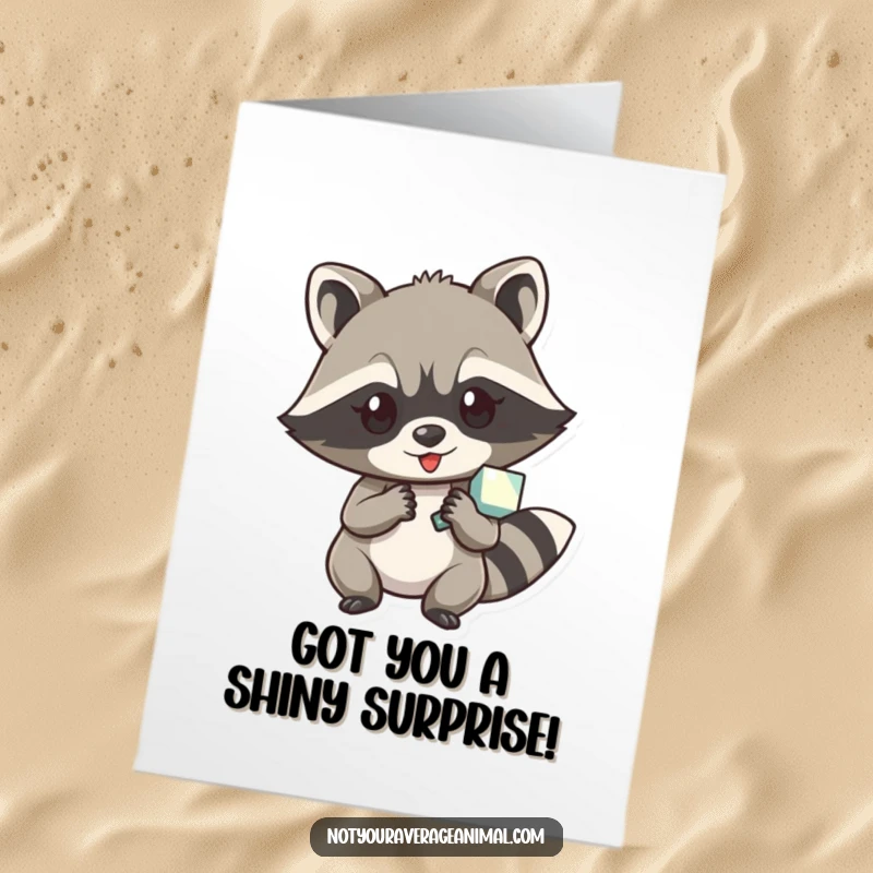 Funny Free Printable Birthday Card: Mischievous raccoon character slyly holding a shiny object, looking a bit too pleased with its 'find'.