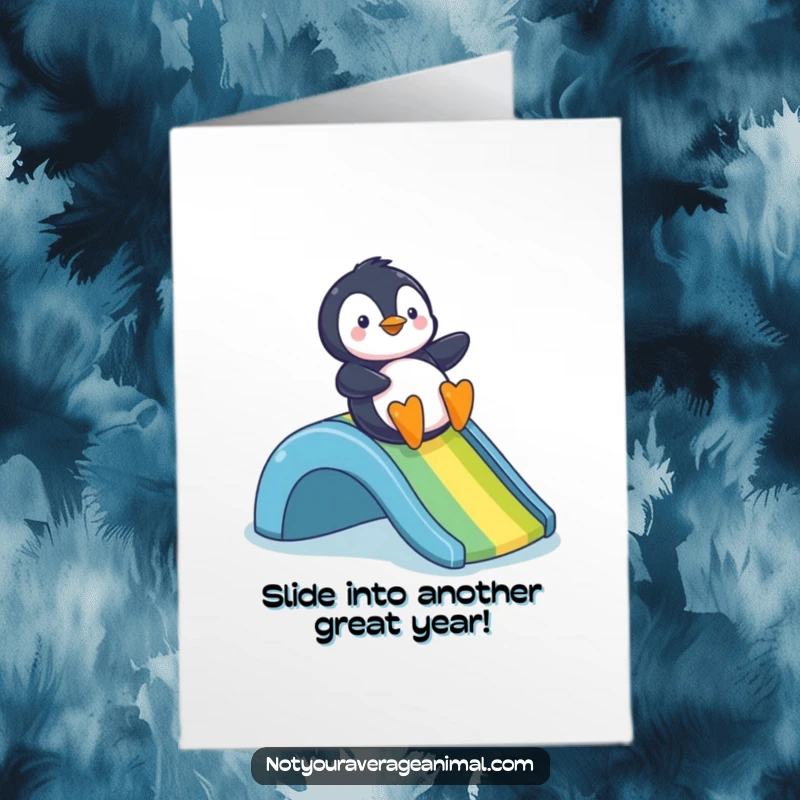 Funny Free Printable Birthday Card of a cheerful penguin joyfully sliding down a vibrant rainbow slide.