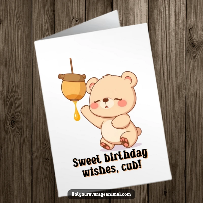 Funny Free Printable birthday card with a sleepy bear cub reaching with great excitement for a dangling pot of honey.