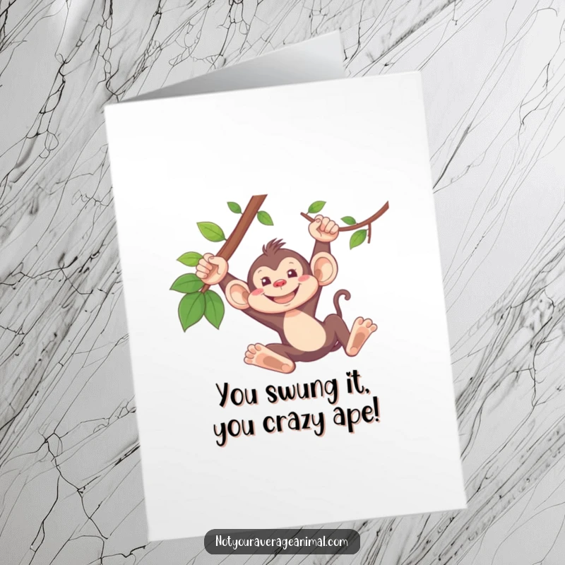 Funny Free Printable monkey congratulations card with a silly monkey swinging from a vine, grinning with excitement, perfect for celebrations.