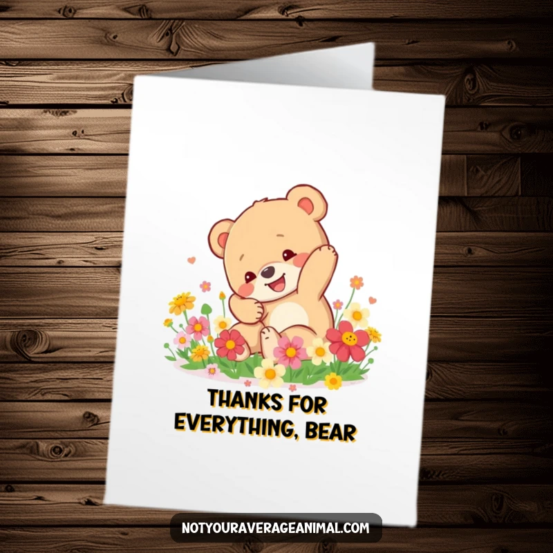 Funny free printable thank you card of a happy bear cub tumbling in flowers, sending a joyful thank you.