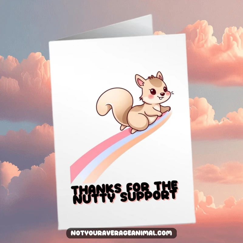 Playful free printable thank you card of a squirrel sliding down a rainbow, conveying colorful thanks.