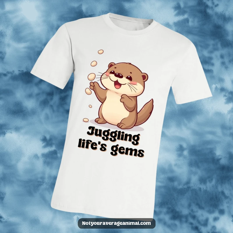 Funny t-shirt showcasing a curious otter joyfully juggling shiny pebbles, embodying playful delight.