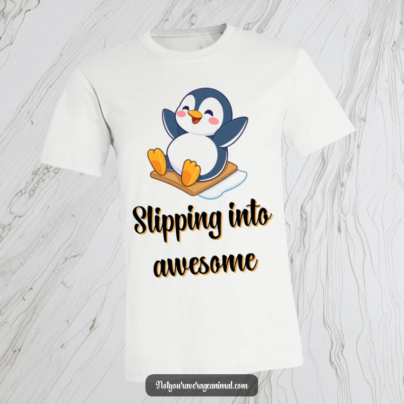 Funny T-shirt featuring a happy penguin character sliding down an icy slope with pure joy, great for winter lovers.