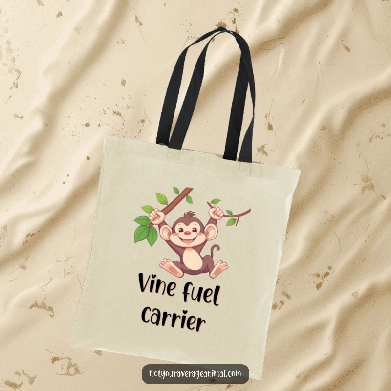 Funny monkey tote bag with a silly monkey grinning while swinging from a vine, perfect for carrying items.