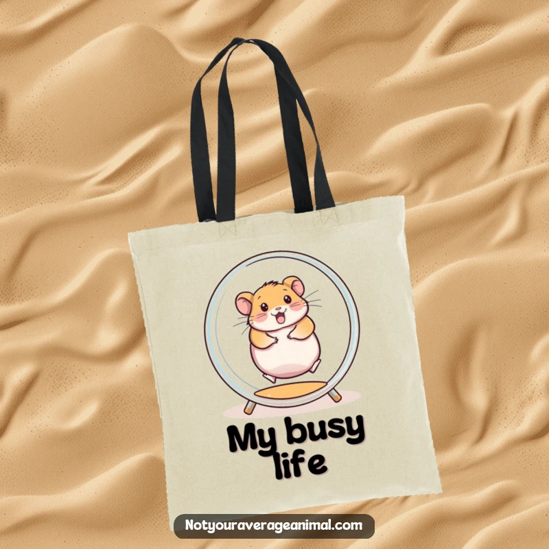 Funny tote bag illustrating a chubby hamster spinning enthusiastically inside a transparent exercise wheel, ready for any journey.
