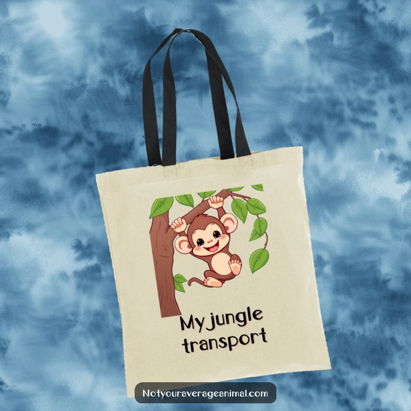 Funny tote bag featuring a silly monkey swinging from a vine with a huge grin, perfect for carrying daily items with a tropical twist.