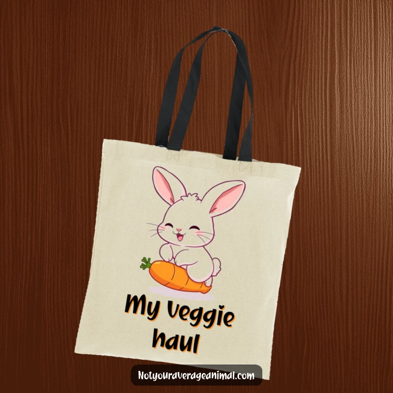 Funny tote bag showcasing a fluffy rabbit with prominent ears, joyfully hopping over a comically bouncing carrot, ready for errands.