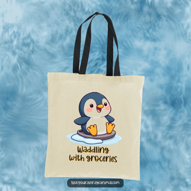Funny happy penguin tote bag, showing a character sliding joyfully on ice, perfect for winter trips.